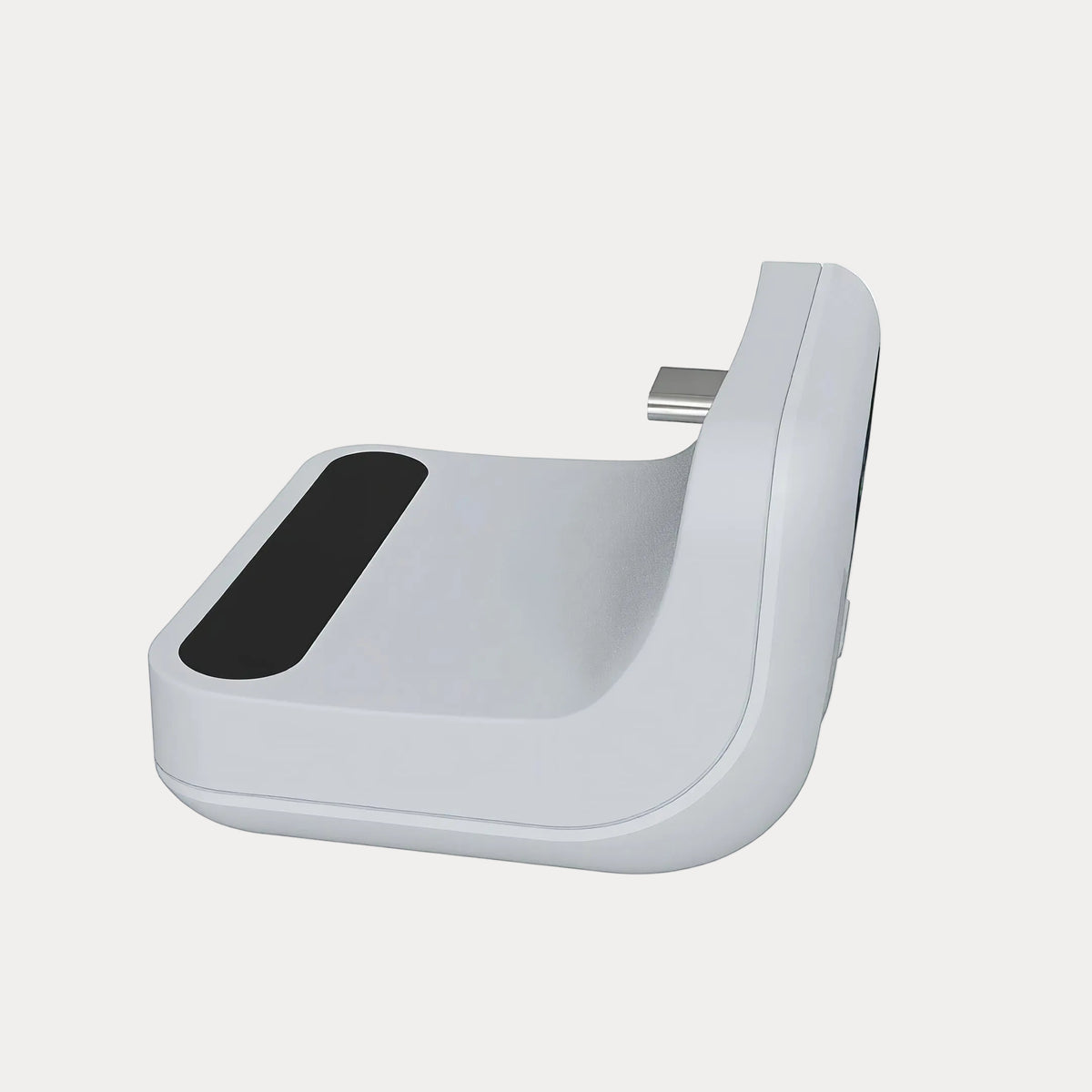 A controller power bank on a light gray backround.