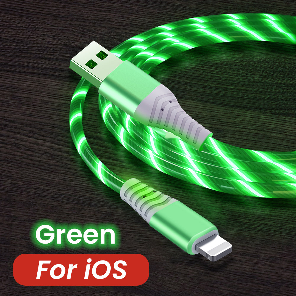 Green USB cable on a dark wooden surface
