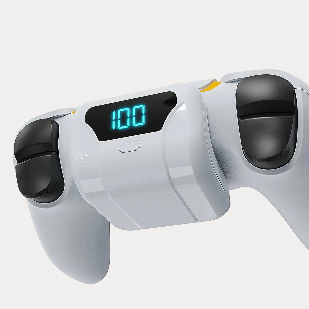 A power bank with digital display plugged on a PS5 controller on a light gray backround.
