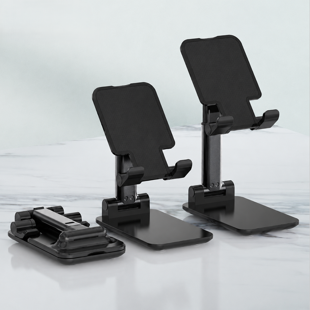 Black adjustable smartphone stands with a stand folded flat beside them, shown on a light gray marble-like surface against a pale gray background.