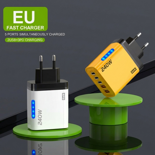 Two EU fast chargers, one white and one yellow, on a dark background with green stands.