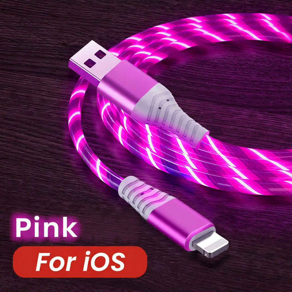 Pink USB cable with lightning connector on a dark wooden surface