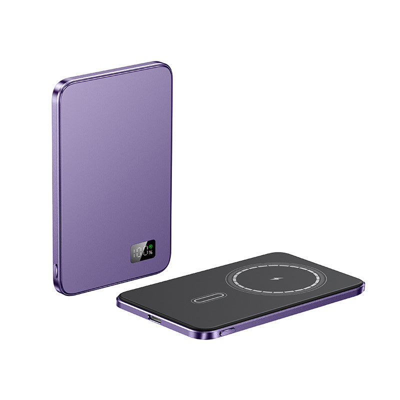Purple wireless power bank on a white background