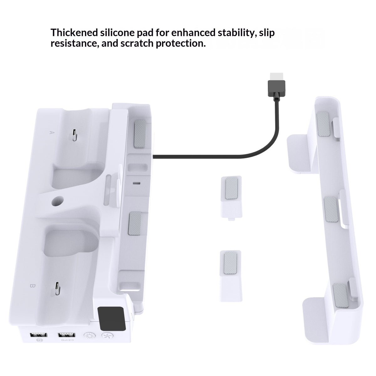 White electronic charging dock with thickened silicone pads and a black charging cable, shown on a white background with a text callout explaining the stability and scratch protection benefits.