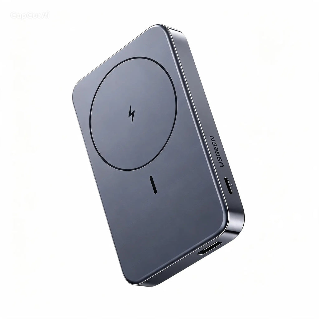 Sleek dark gray magsafe power bank with wireless charging pad shown at an angle on a white background
