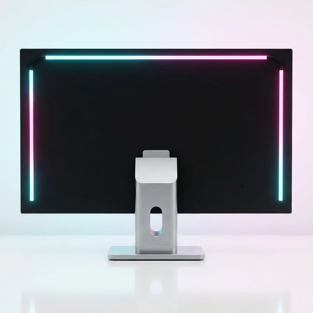 Back view of a computer monitor with illuminated RGB LED light strip attached along the edges
