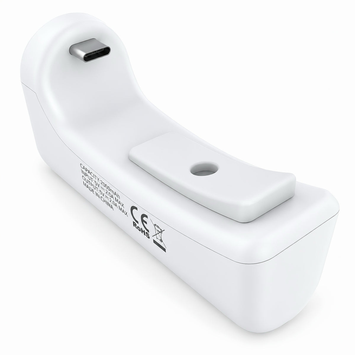 Close-up view of the white PS5 controller charging dock showing the Type-C plug and locking clip