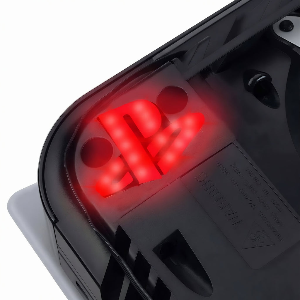 Red illuminated RGB LED light strip installed under the PS5 console logo